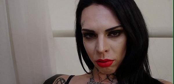  Tattooed up trans chick tugging on her cock